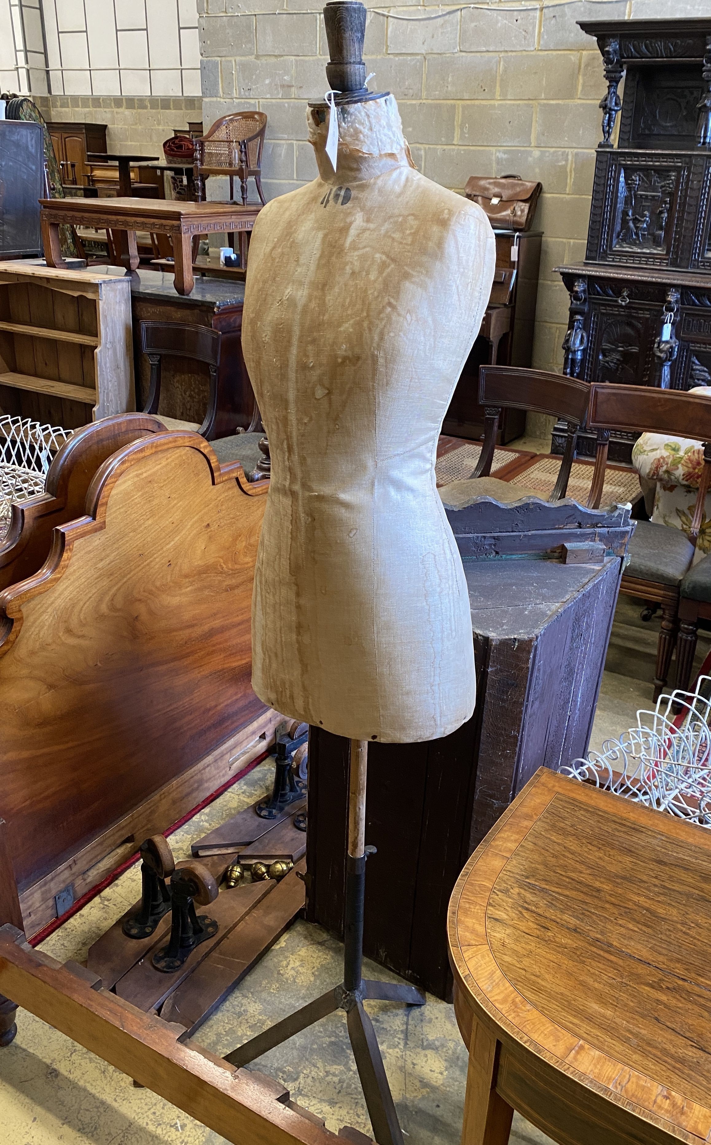A Victorian tailor's dummy on iron tripod stand, height 170cm